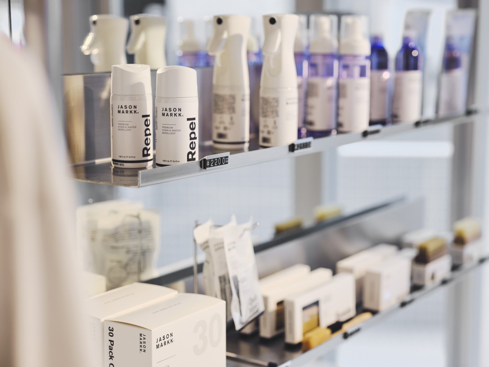 16 Jason Markk Flagship Store- Care products on shelf.jpg