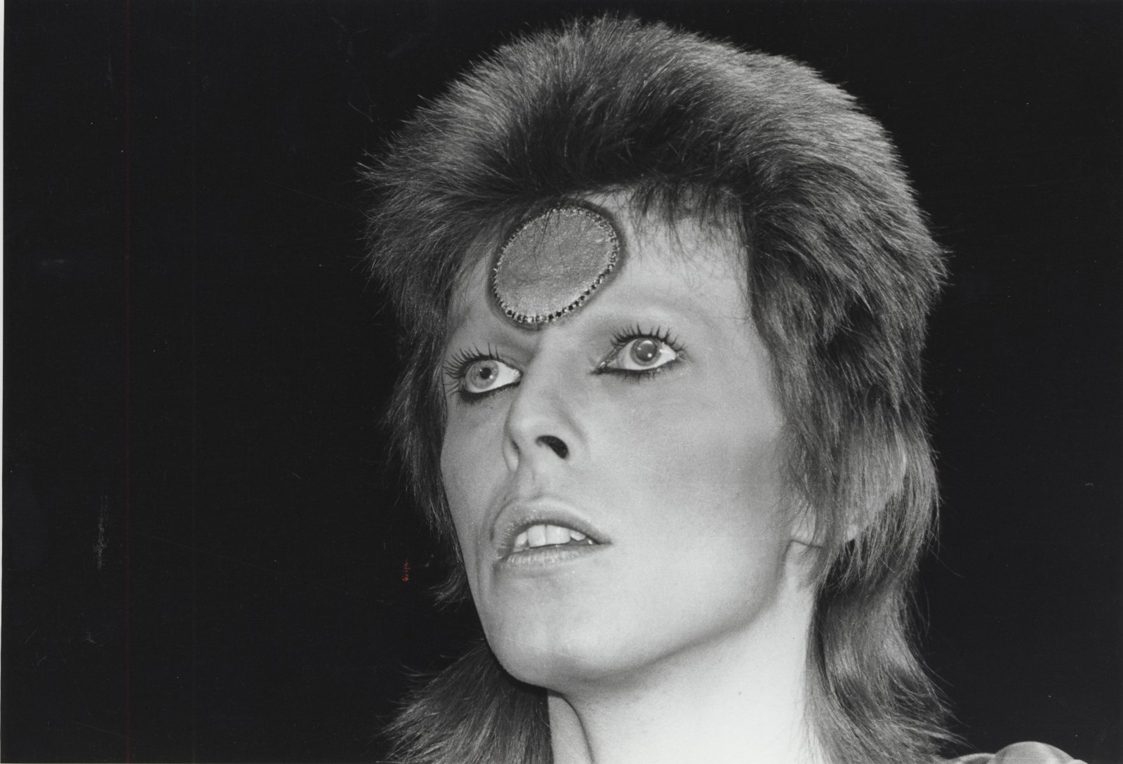 1.David Bowie performing on the Ziggy Stardust tour, 1973 ﾂｩ Mick Rock 1973, Estate of Mick Rock 2025.jpg